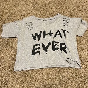 Cropped shirt that says “whatever”
